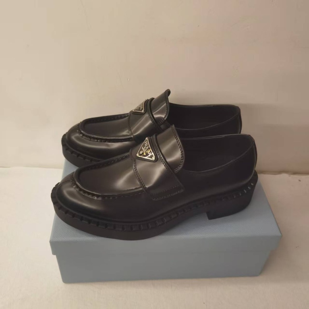 Prada Women's Glossy Black Loafers